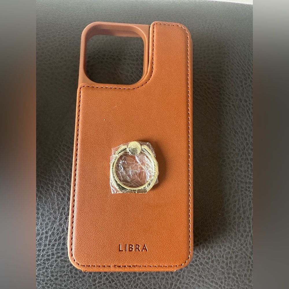 Libra iPhone 15 Promax phone case with wallet. Brand new.